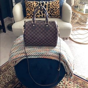 Off brand brown checkered handbag.